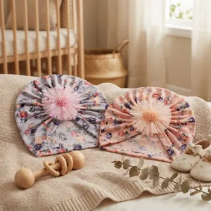 Two-pack floral baby turban hats with mesh flowers in grey and pink cotton
