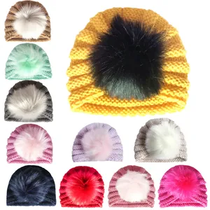 Berretto in maglia per neonati con grande pompon di pelliccia in 11 colori vivaci
