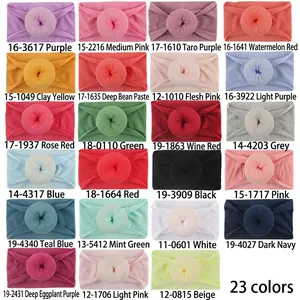 Soft nylon baby headbands with donut knot design available in 23 vibrant colors set