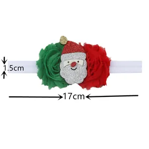 Détail des dimensions du bandeau de Noël avec père Noël et décorations florales en résille