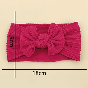 Rose red knitted baby headband with large bow 18x9cm size for newborn comfort