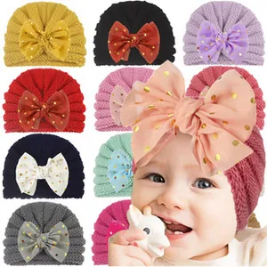Detail of baby headband featuring large sequin tulle bow and 10 color variations