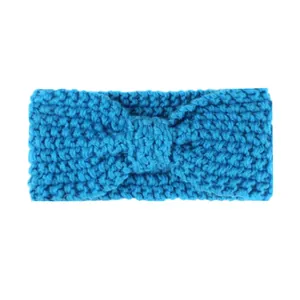Winter knitted baby headband with a bright blue bow for ear protection and warmth