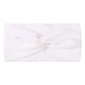 Detail of soft white nylon twist knot headband for babies with high-quality fabric texture