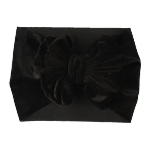 Bandeau bébé en velours noir doux orné d'un grand nœud pour le style des enfants