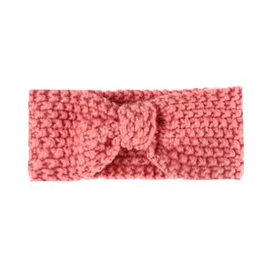 Pink knit baby headband with bow, cozy winter ear warmer for toddlers and infants
