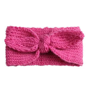 Fascia neonata in maglia color magenta con grande fiocco e morbida trama a coste invernali