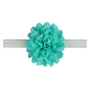 Bandeau bébé vert menthe avec fleur découpée au laser sur un bandeau élastique doux