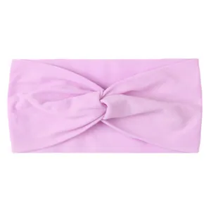 Close-up of light pink wide nylon headband with a stylish twist knot for baby girls