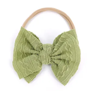 Bandeau bébé en tricot jacquard vert sauge avec ruban en nylon beige sans couture