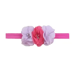 Elastic baby headband with three chiffon flowers, faux pearls and sparkling rhinestones