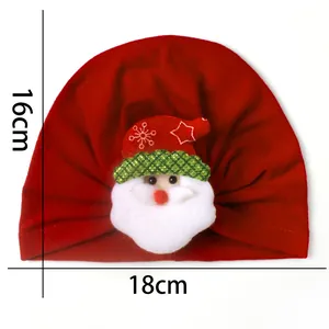 Detailed view of red Christmas baby beanie with Santa patch, sized 18cm by 16cm