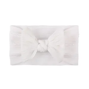 Fascia per neonati in nylon bianco morbido con fiocco grande e trama a treccia elastica