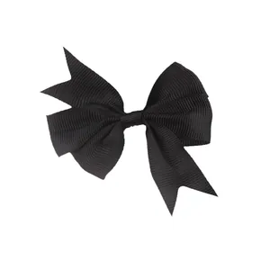 Detailed close-up of a black grosgrain ribbon bow with a textured ribbed finish and swallowtail cut