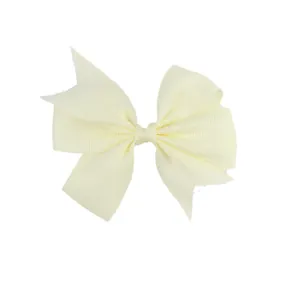 Detailed view of the layered cream ribbed ribbon texture on this stylish baby bow hair clip