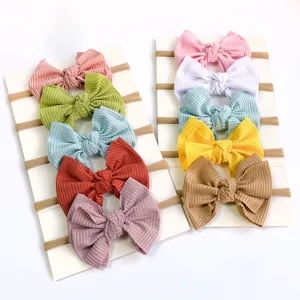 10-piece set of ribbed bow baby headbands in assorted soft candy colors for infants