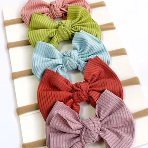 Set of five ribbed bow baby headbands in assorted pastel colors for infants and toddlers