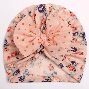 Baby floral turban hat with big pink polka dot bow and delicate flower print