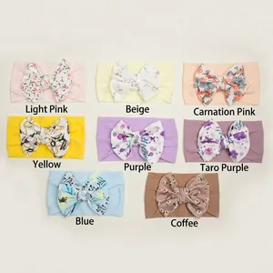 Set of 8 colorful baby bow headbands with floral patterns and soft elastic fabric