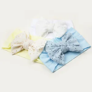 Bandeaux bébé en nylon doux avec grands nœuds brodés en blanc, crème et bleu pastel