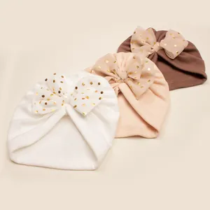 Baby turban hats with gold polka dot mesh bows in white, pink and brown colors