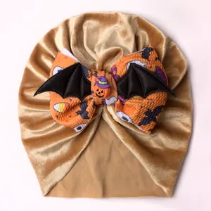 Halloween baby turban hat in brown velvet with orange bat bow and wings