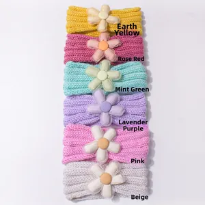 Detailed set of six knitted baby headbands with large flowers in assorted colors