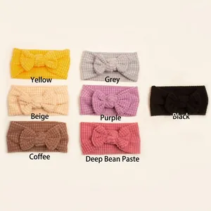 Cute waffle fabric baby headbands with large bows in seven assorted colors for infants