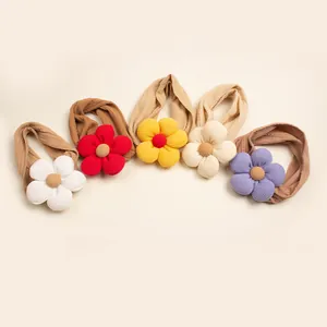 Set of five colorful nylon baby headbands with corduroy flower decor for girls