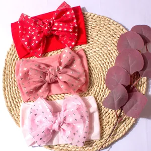 Lot de 3 bandeaux bébé avec nœuds en maille pailletée dans les tons rouges et roses