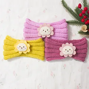 Three-pack of knitted baby headbands with cute smiling sunflower patches for warmth