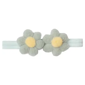 Detailansicht der handgefertigten Plüschblumen und elastischem Band für Baby-Stirnbänder