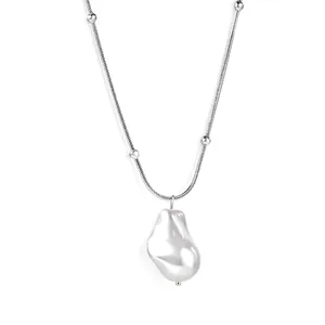 Baroque pearl pendant on silver snake chain necklace featuring elegant irregular shape