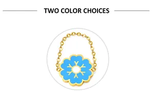 Detail of blue enamel flower pendant with golden link chain and intricate petal design