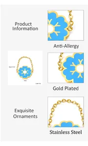 Blue enamel flower ring with gold detail and size specifications in millimeters