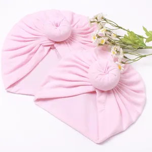 Set of two pink donut knot baby turban hats in soft knit fabric for mothers and babies