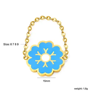 Creative gold-plated chain ring with light blue enamel flower pendant size 15mm