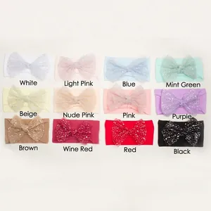 Detailed grid showing twelve colors of soft nylon mesh bow headbands for infants