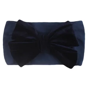 Detailed view of dark blue velvet fabric and soft elastic headband for baby girls