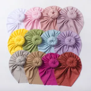 Lot de 12 bonnets côtelés pour bébés avec nœud en plusieurs couleurs pastel doux