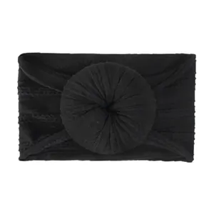 Soft black nylon jacquard baby headband with stylish donut knot detail for toddlers