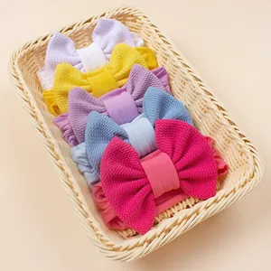 Detailed waffle texture and elastic nylon band of colorful baby bow headbands