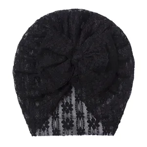 Breathable black lace baby turban hat with a large bow detail for newborns and toddlers