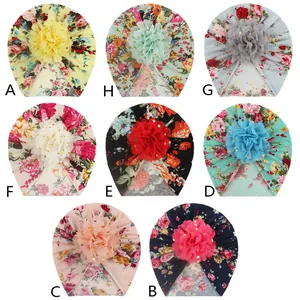 Detailed grid view of assorted baby turban hats with vibrant floral prints and mesh petals