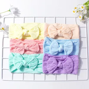 Set of 6 infant nylon bow headbands in pastel colors for newborn baby girls