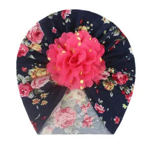 Navy floral baby turban with large pink gold-dotted chiffon flower for toddlers