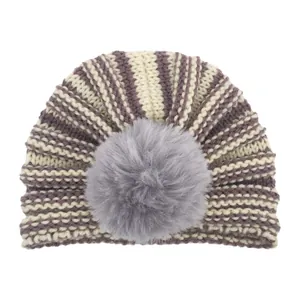 Detail of baby knit turban hat featuring purple stripes and a large grey faux fur pompom