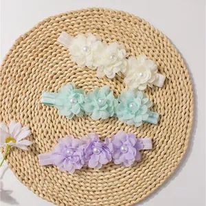 Lot de trois bandeaux élastiques pour bébé avec fleurs en mousseline et perles