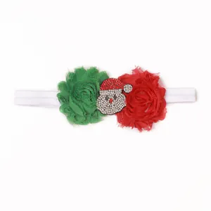 Detail of Christmas baby headband with handmade chiffon flowers and rhinestone Santa Claus