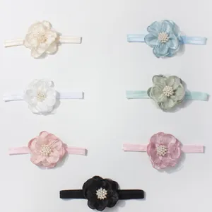 Set van zeven elastische baby-hoofdbanden met chiffon bloemen en parels in diverse kleuren